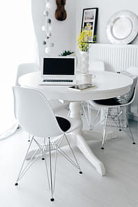 Workplace with laptop on table at home thumbnail