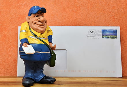 mailman figurine near mail thumbnail