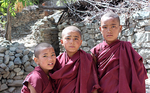 three boys in monk outfits thumbnail
