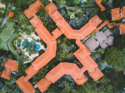 overview of orange house during daytime photography thumbnail