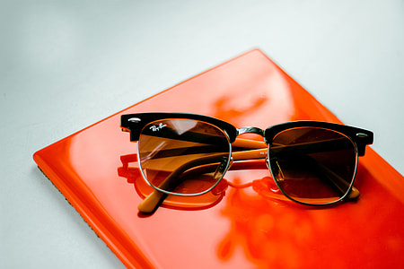 Sunglasses sitting on office table thumbnail