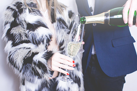 Man Pouring Glass of Champagne thumbnail