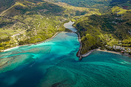 body of water surrounded of hills thumbnail