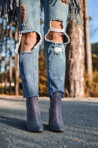 woman standing on gray concrete taken at daytime thumbnail