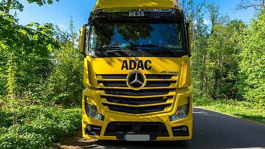 yellow Mercedes-Benz truck thumbnail
