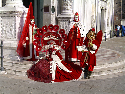 four people wearing play costumes thumbnail
