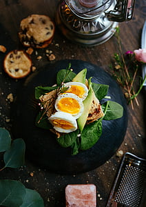 slice boiled eggs on sandwich with spinach thumbnail
