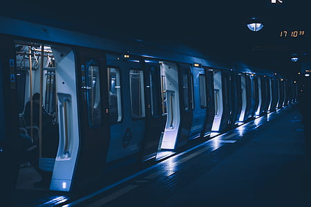 person sitting inside the train during nighttime thumbnail