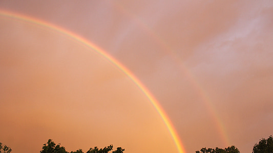 rainbow under orange sky thumbnail