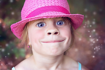 girl wearing pink hat thumbnail