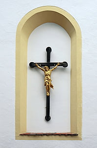 crucifix signage on arch shelf thumbnail