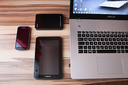 Smartphone, Tablet and Laptop on Desk thumbnail