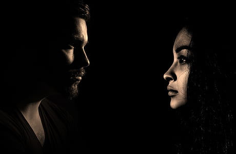 man and woman in dark room thumbnail
