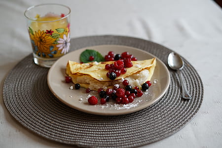 taco with berries served on plate thumbnail