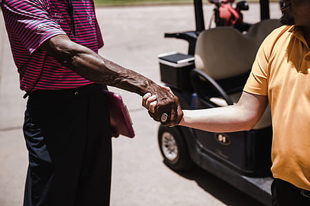 Two Men Shaking Each Other's Hands thumbnail