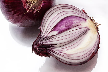 sliced onion on white surface thumbnail