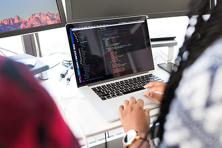Person Using Silver Macbook Pro thumbnail