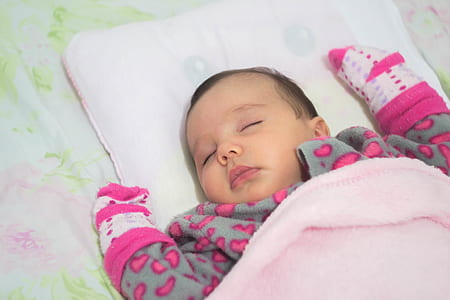 baby sleeping with blanket thumbnail