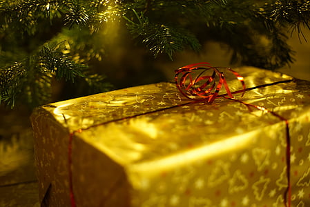 close up photo of yellow Christmas gift box thumbnail