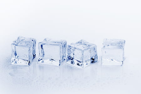 four ice cube on white surface thumbnail