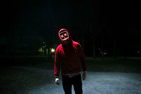 Marshmello standing outside during night thumbnail
