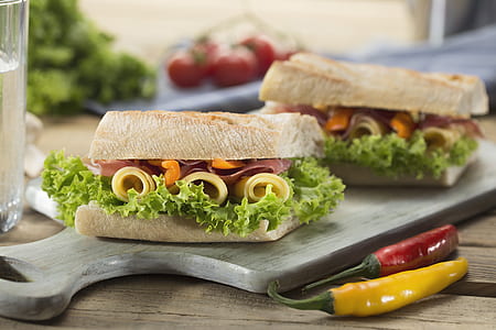 sandwiches served on wooden tray thumbnail