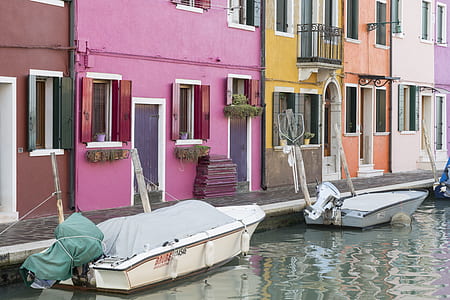 boats next to house thumbnail