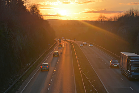 time lapse photo of cars on road thumbnail