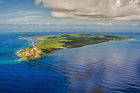 aerial view of island surrounded bodies of water thumbnail
