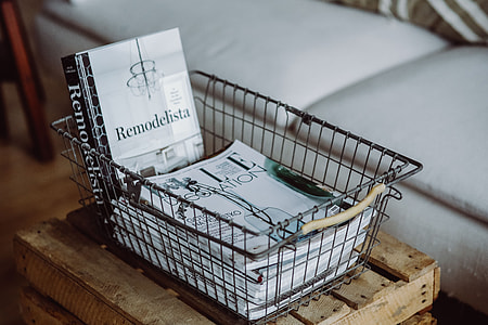 Magazines in a metal basket thumbnail