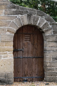 stone house with wooden door thumbnail