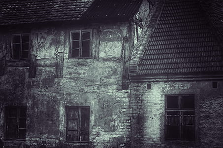 grayscale photography of concrete 2-storey house thumbnail