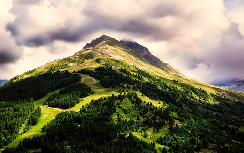 aerial photography of green mountain at day time thumbnail