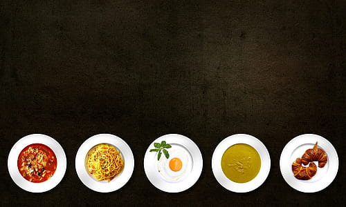 Five White Plates With Different Kinds of Dishes thumbnail