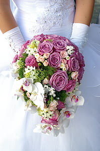 close up photo of person holding bouquet thumbnail