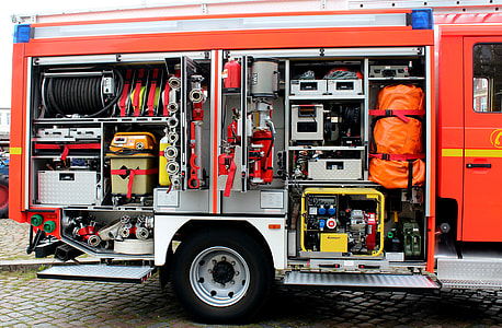 red and white firetruck at daytime thumbnail