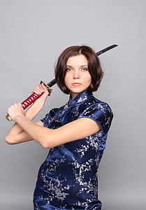 woman wearing blue and gray kimono holding katana thumbnail