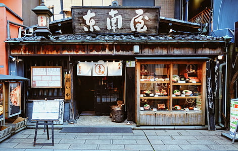 brown wooden crafts store at daytime thumbnail