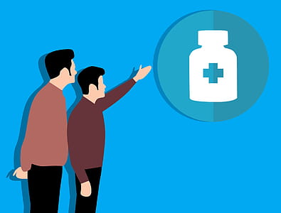Two men looking at bottle of medication. thumbnail