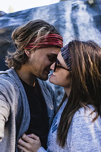 woman holding man shirt facing faces thumbnail