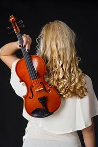 women with blonde hair holding violin thumbnail