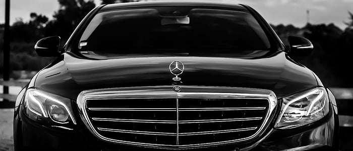 black Mercedes-Benz sedan thumbnail