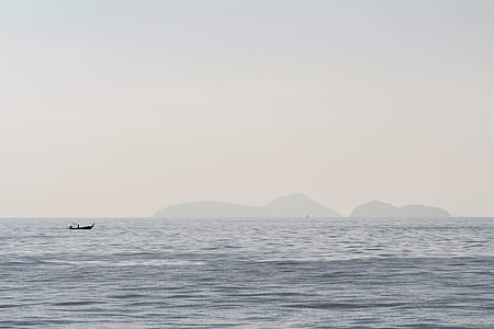boat at sea during daytime thumbnail