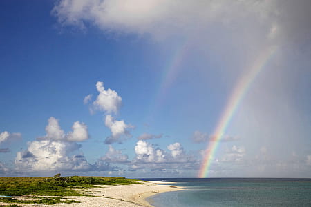 rainbow and white clouds photo thumbnail