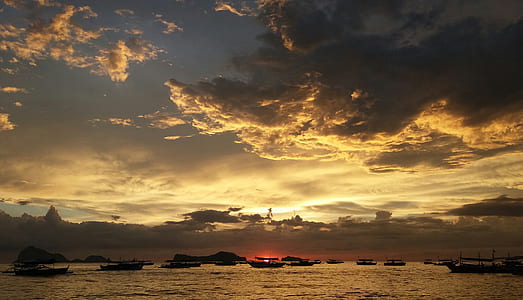 Silhouette of Ships during Sunset thumbnail