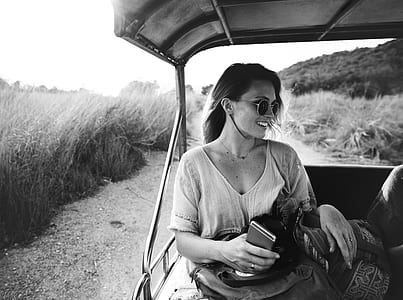 woman holding bag grayscale photo thumbnail
