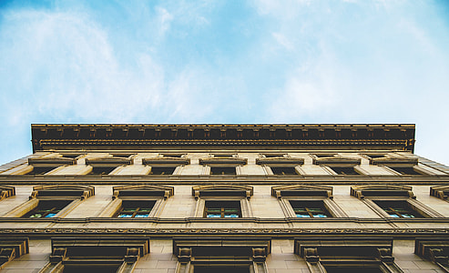 brown concrete building photography thumbnail