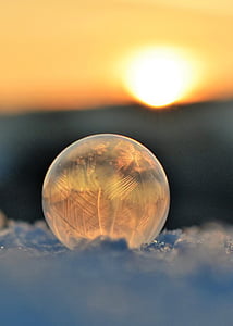 close-up photo of glass ball during golden hour thumbnail