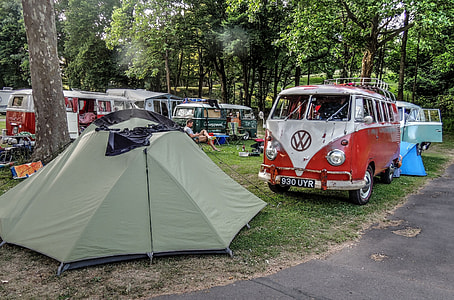 bus beside tent thumbnail