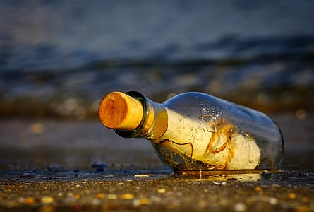 clear glass bottle with cork thumbnail